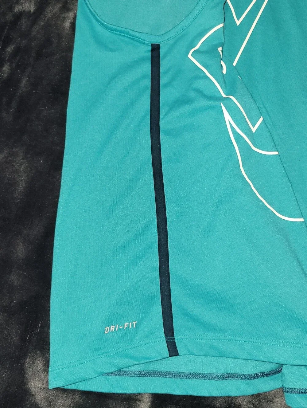 Nike features teal